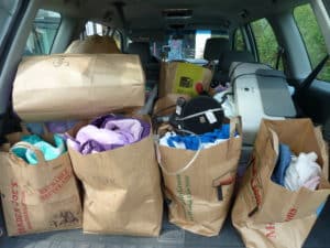 My car, filled with a client's donations headed to Goodwill.